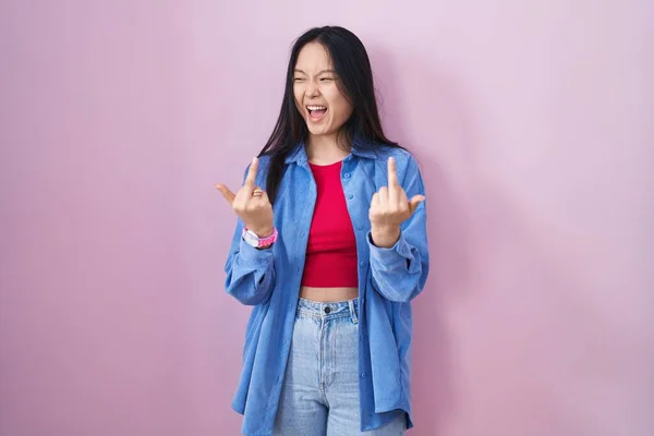 Young Asian Woman Standing Pink Background Showing Middle Finger Doing — Foto Stock