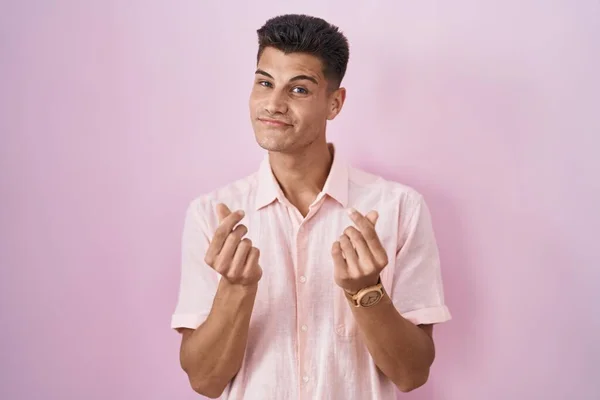 Young Hispanic Man Standing Pink Background Doing Money Gesture Hands — Foto de Stock