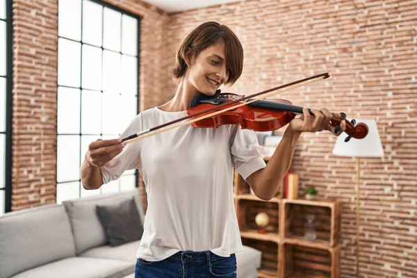 Young Beautiful Hispanic Woman Musician Smiling Confident Playing Violin Home —  Fotos de Stock