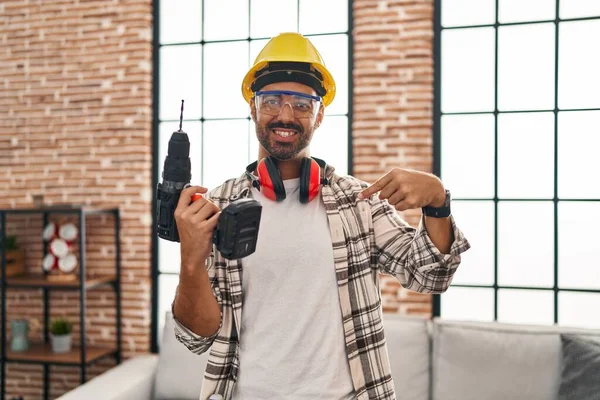 Young Hispanic Man Beard Working Home Renovation Pointing Finger One — Stock Photo, Image