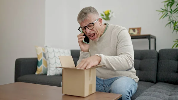 Middle Age Grey Haired Man Talking Smartphone Arguing Package Home — Stock Photo, Image