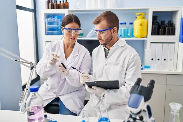 Man Woman Scientist Partners Write Clipboard Holding Test Tube Working — Stock Photo, Image