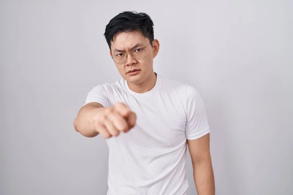 Young Asian Man Standing White Background Pointing Displeased Frustrated Camera — Stock Photo, Image