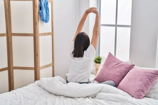 Young Hispanic Woman Waking Sitting Bed Bedroom — Stok fotoğraf