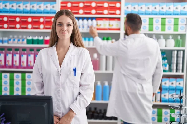 Man Woman Pharmacists Smiling Confident Standing Pharmacy — Stockfoto