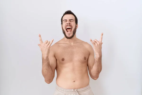 Young Hispanic Man Standing Shirtless White Background Shouting Crazy Expression — Stock Photo, Image