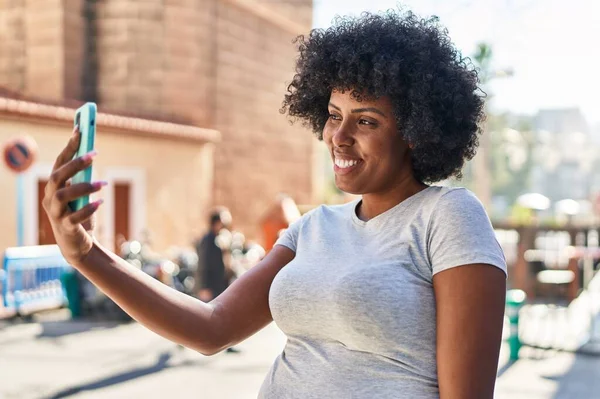 African American Woman Smiling Confident Having Video Call Street — стокове фото