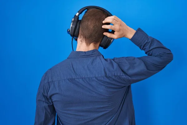 Hispanic Man Beard Listening Music Wearing Headphones Backwards Thinking Doubt — Stock Photo, Image
