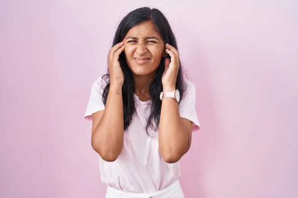Young Hispanic Woman Standing Pink Background Covering Ears Fingers Annoyed — Stock Photo, Image