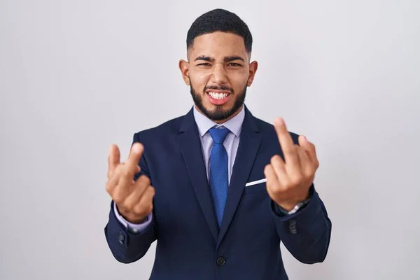 Young Hispanic Man Wearing Business Suit Tie Showing Middle Finger —  Fotos de Stock