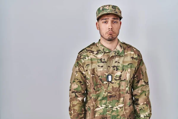 Young Hispanic Man Wearing Camouflage Army Uniform Depressed Worry Distress — Stock Photo, Image