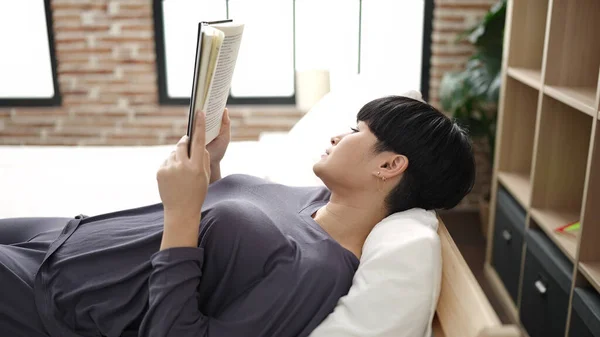 Young Chinese Woman Reading Book Lying Bed Bedroom — 스톡 사진