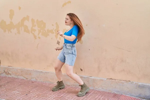 Young Redhead Woman Smiling Confident Dancing Street — Stockfoto