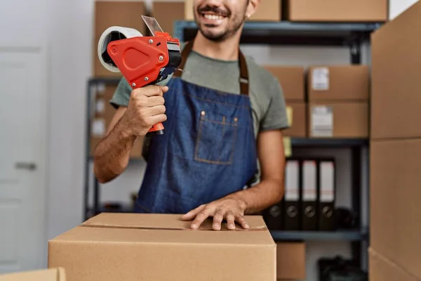 Young Hispanic Man Business Worker Holding Packing Tape Storehouse — Stock Photo, Image