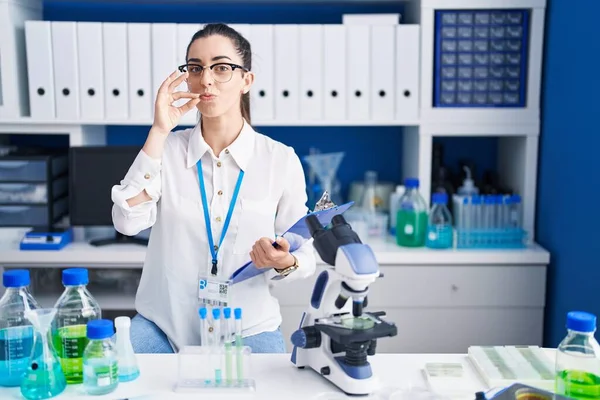 Young Brunette Woman Working Scientist Laboratory Mouth Lips Shut Zip — Stock Photo, Image