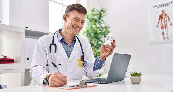 Young Man Doctor Prescribing Pills Treatment Writing Document Clinic — Stock Photo, Image