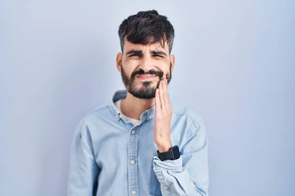 Young Hispanic Man Beard Standing Blue Background Touching Mouth Hand — Stock Photo, Image
