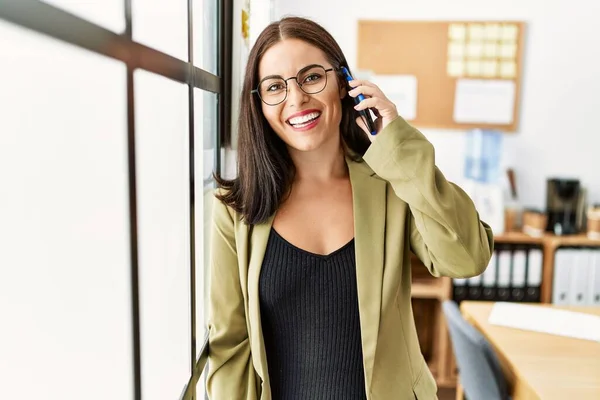 Young Beautiful Hispanic Woman Business Worker Smiling Confident Talking Smartphone — Foto de Stock