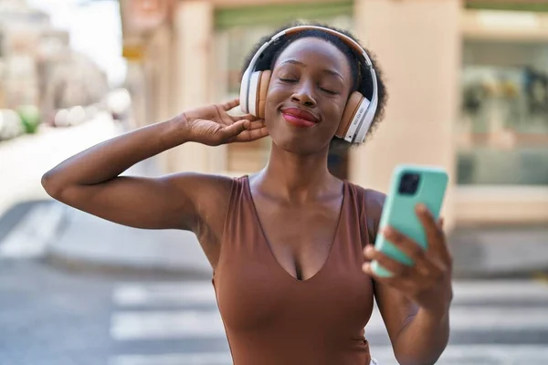 African American Woman Smiling Confident Listening Music Street —  Fotos de Stock