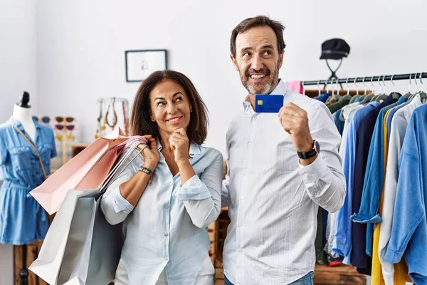 Hispanic Middle Age Couple Holding Shopping Bags Credit Card Hand — Stock Photo, Image