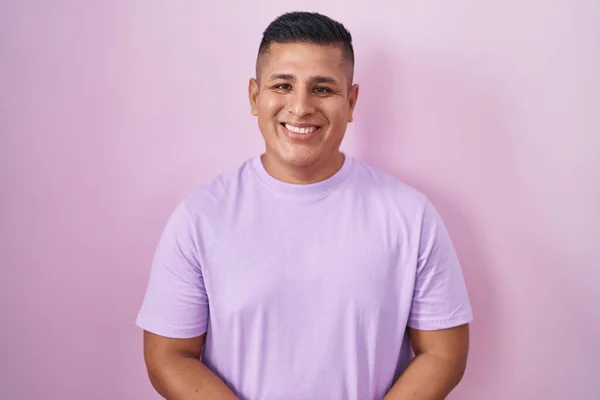 Young Hispanic Man Standing Pink Background Hands Together Crossed Fingers — Stock Photo, Image