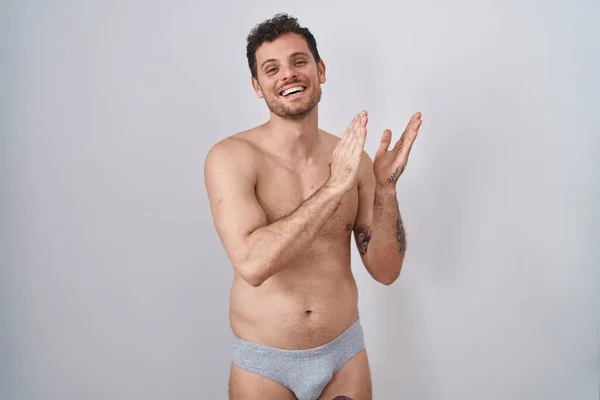 Young Hispanic Man Standing Shirtless Wearing Underware Clapping Applauding Happy — Stock Photo, Image