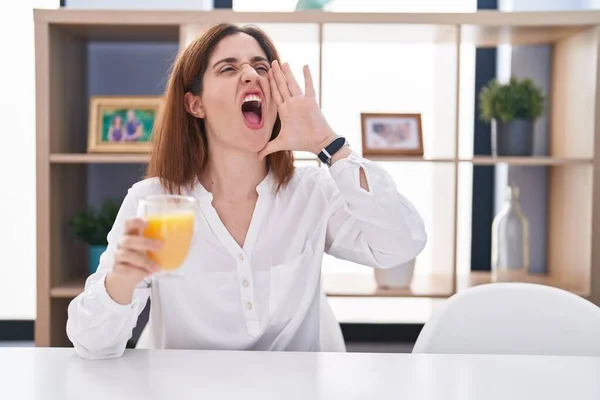 Brunette Woman Drinking Glass Orange Juice Shouting Screaming Loud Side — Stock Photo, Image