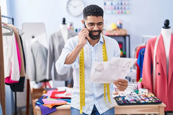 Young Arab Man Tailor Talking Smartphone Looking Clothing Design Tailor — Stock Fotó