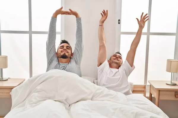 Two Men Couple Waking Stretching Arms Bedroom — Stockfoto