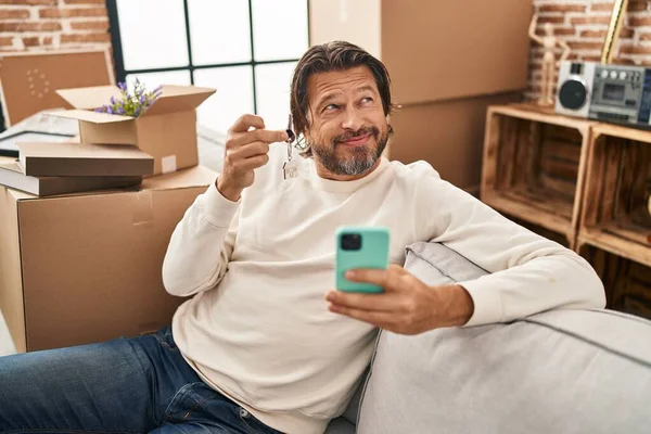 Handsome Middle Age Man Holding Keys New Home Doing Video — Stock Photo, Image