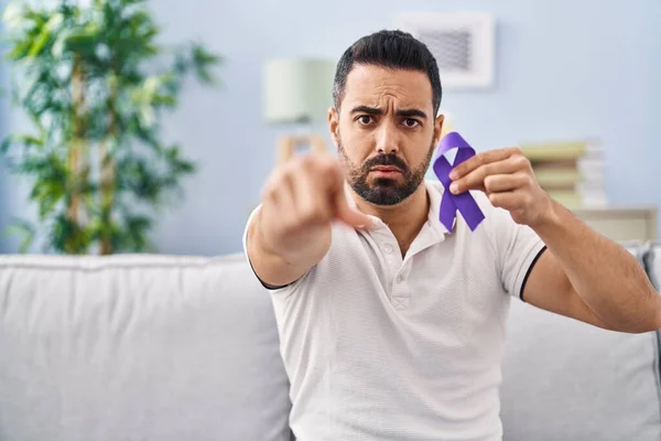 Young Hispanic Man Beard Holding Purple Ribbon Awareness Pointing Finger — Stock Photo, Image