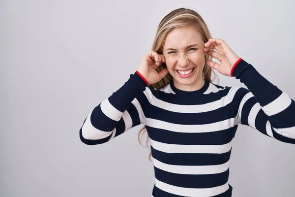 Young Caucasian Woman Wearing Casual Navy Sweater Covering Ears Fingers — Stock Photo, Image