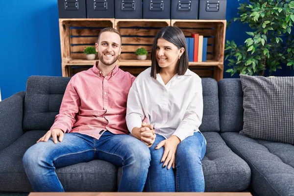 Man Woman Couple Sitting Sofa Hands Together Home — Stock Photo, Image