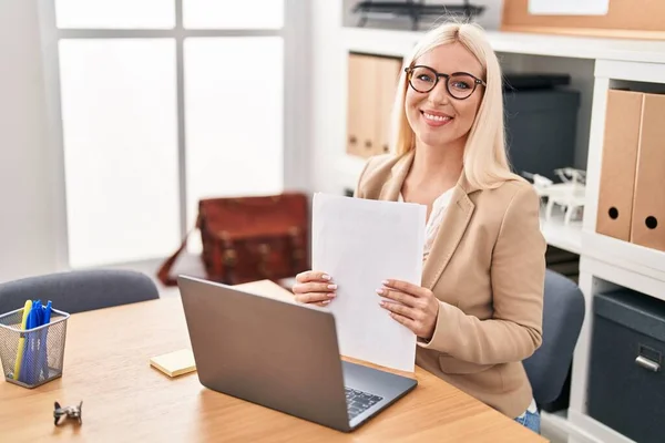 Young Blonde Woman Business Worker Using Laptop Working Reading Document — Stockfoto