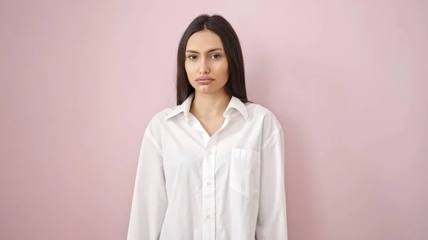 stock image Young beautiful hispanic woman standing with relaxed expression over isolated pink background