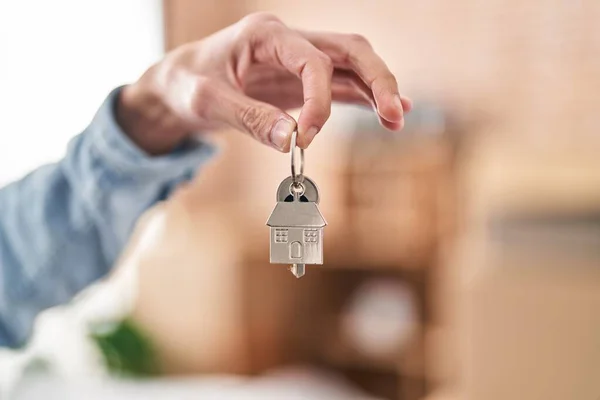 Young Hispanic Man Holding Key New Home —  Fotos de Stock