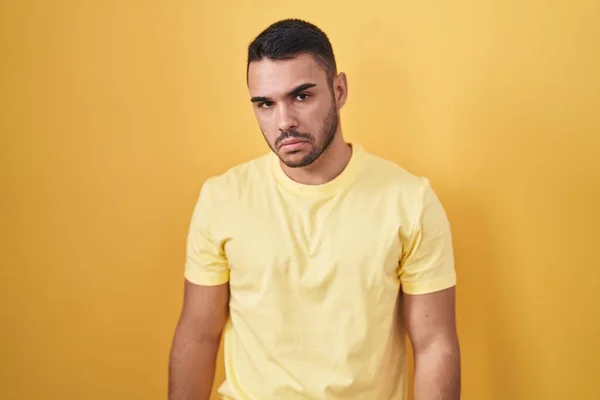 Young Hispanic Man Standing Yellow Background Depressed Worry Distress Crying — Stock fotografie
