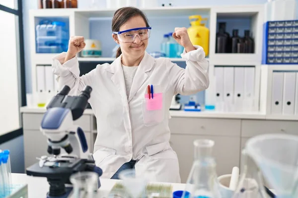 Hispanic Girl Syndrome Working Scientist Laboratory Showing Arms Muscles Smiling — Stock Photo, Image