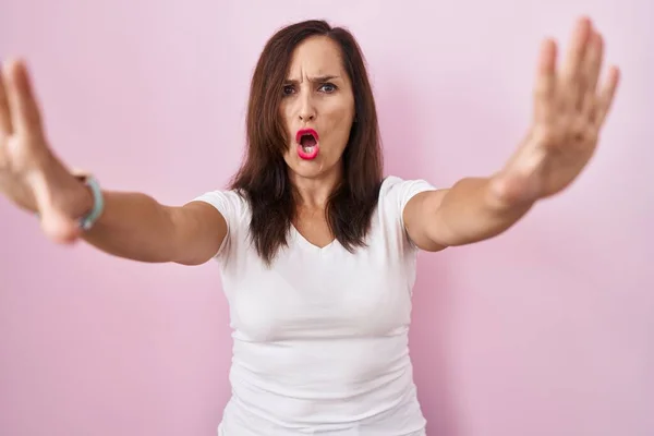 Middle Age Brunette Woman Standing Pink Background Doing Stop Gesture — Stock Photo, Image