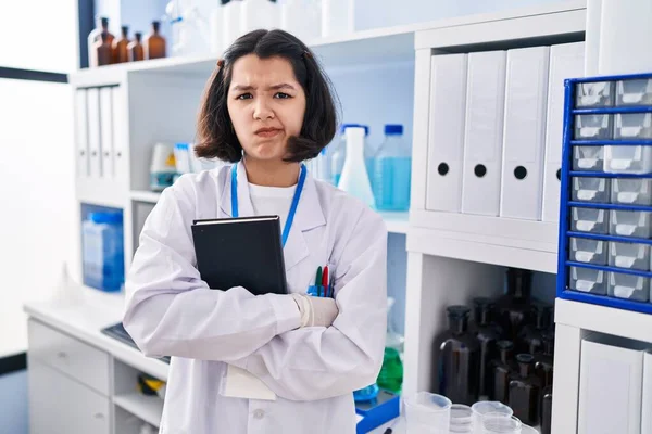 Young Hispanic Woman Working Scientist Laboratory Skeptic Nervous Frowning Upset — Zdjęcie stockowe