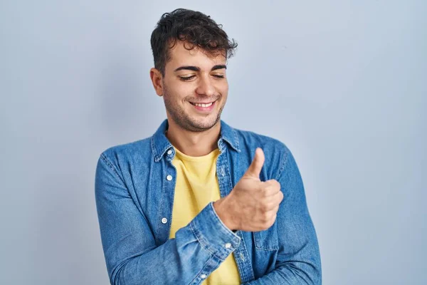 Young Hispanic Man Standing Blue Background Looking Proud Smiling Doing — Stockfoto