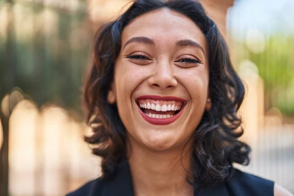 stock image Young beautiful hispanic woman smiling confident standing at street