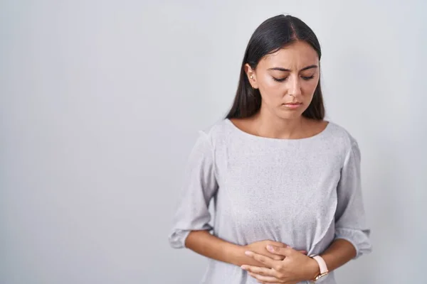 Young Hispanic Woman Standing White Background Hand Stomach Because Indigestion — Foto de Stock