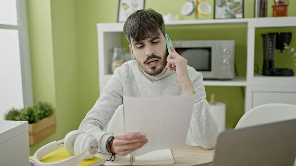 Young Hispanic Man Talking Phone Reading Document Dinning Room — Stock Photo, Image