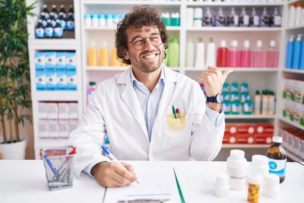 Hispanic Young Man Working Pharmacy Drugstore Smiling Happy Face Looking — Stock Photo, Image