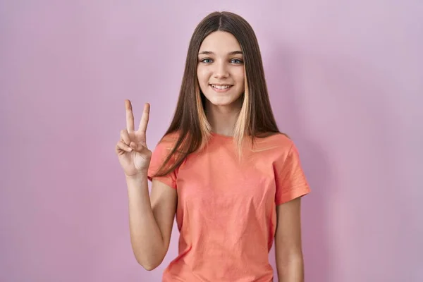 Teenager Girl Standing Pink Background Showing Pointing Fingers Number Two — Stock Photo, Image