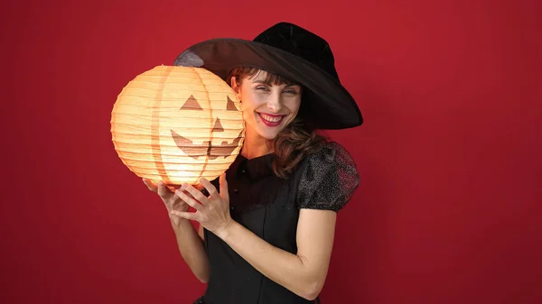 Young Caucasian Woman Smiling Wearing Witch Costume Holding Halloween Pumpkin — 스톡 사진