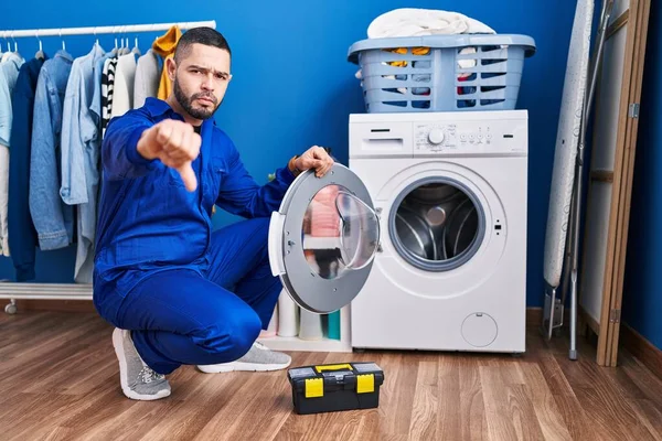 Hispanic Repairman Working Washing Machine Angry Face Negative Sign Showing — Stock Photo, Image