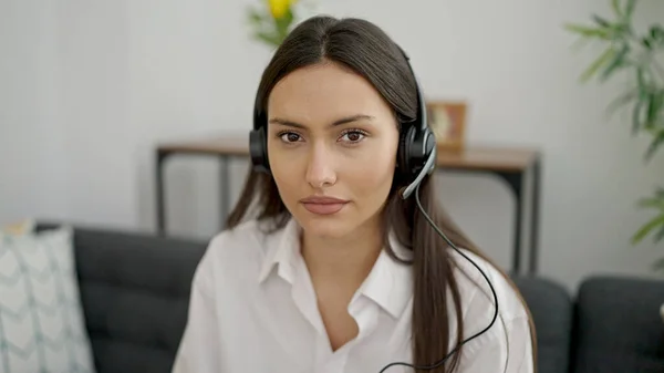 stock image Young beautiful hispanic woman call center agent working at home