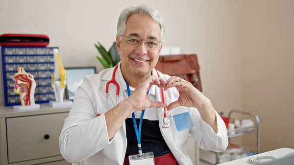 Middle Age Man Grey Hair Doctor Smiling Doing Heart Gesture — Stock Photo, Image